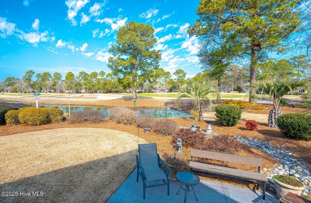 view of patio / terrace with a water view