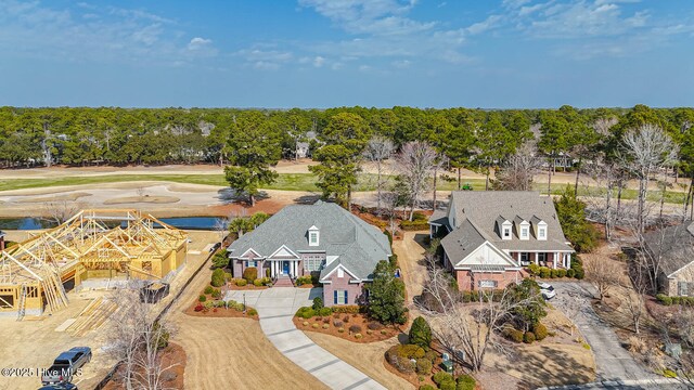 aerial view with a residential view and a water view