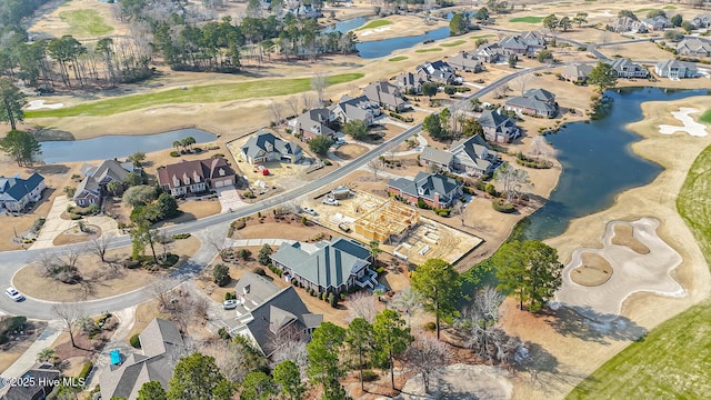 aerial view featuring a water view and a residential view