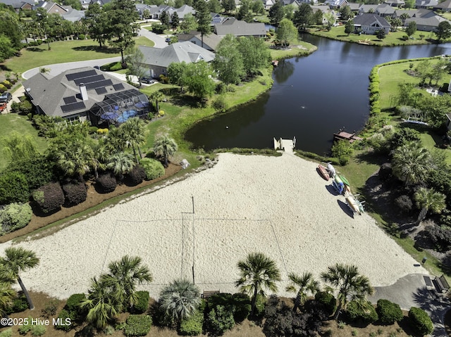 bird's eye view with a water view and a residential view