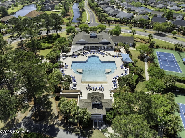 birds eye view of property featuring a residential view and a water view