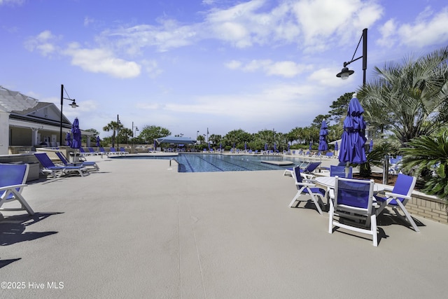 community pool featuring a patio