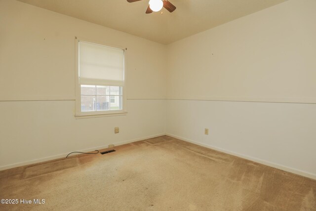 204 Columbia Dr, Jacksonville, NC 28546 - empty room featuring a ceiling fan, carpet floors, baseboards, and visible vents