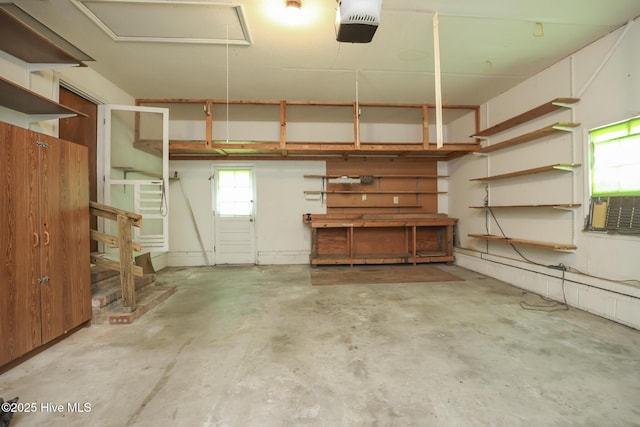 204 Columbia Dr, Jacksonville, NC 28546 - garage featuring a garage door opener