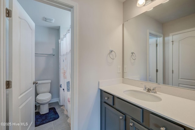 bathroom featuring vanity, baseboards, curtained shower, tile patterned floors, and toilet