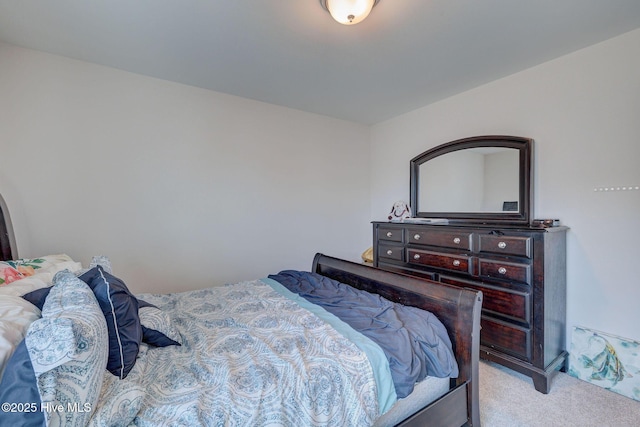 bedroom with light carpet