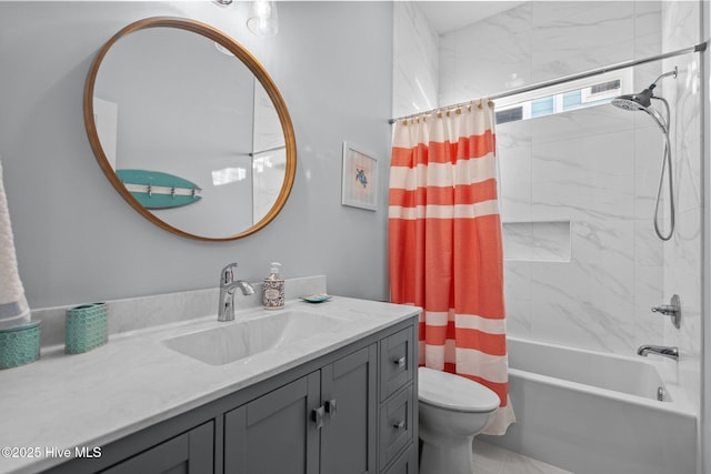 full bath featuring shower / bath combo with shower curtain, toilet, and vanity