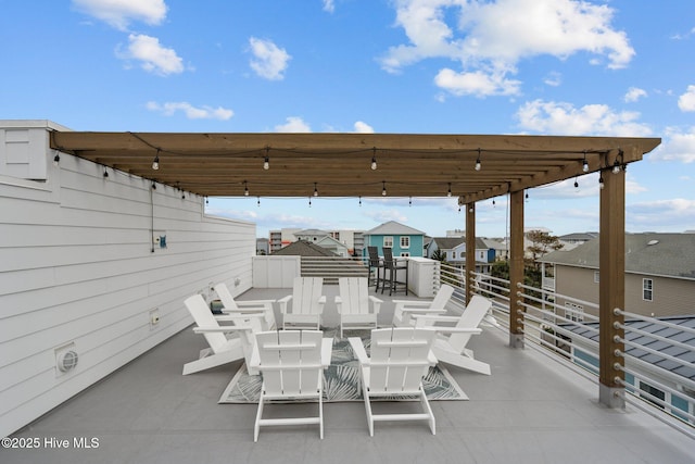 view of patio featuring a residential view and outdoor dining area