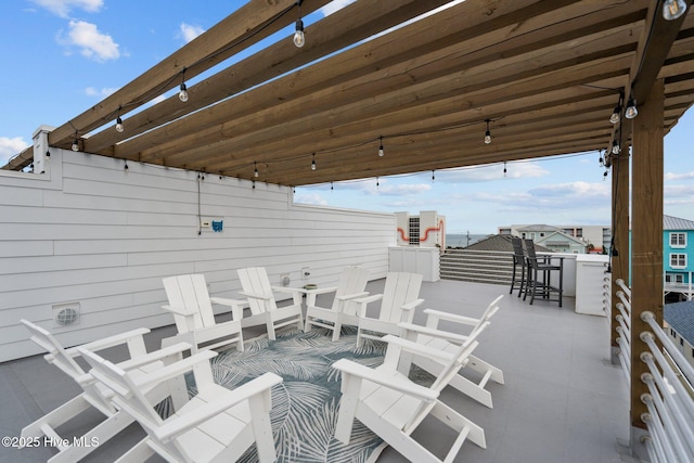 view of patio / terrace with a balcony