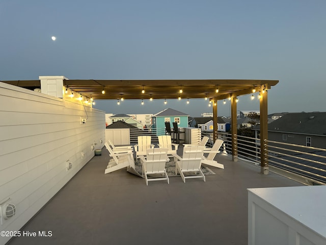 view of patio featuring outdoor dining space and a pergola