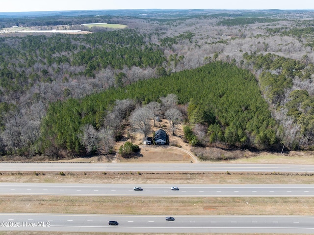 drone / aerial view with a forest view