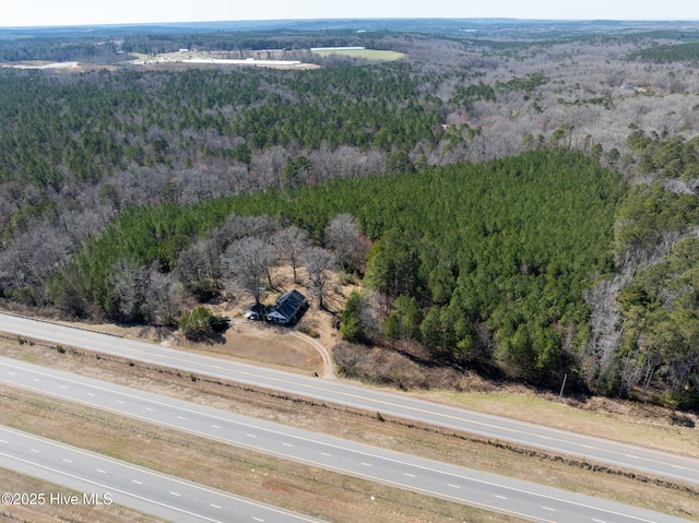 drone / aerial view with a forest view