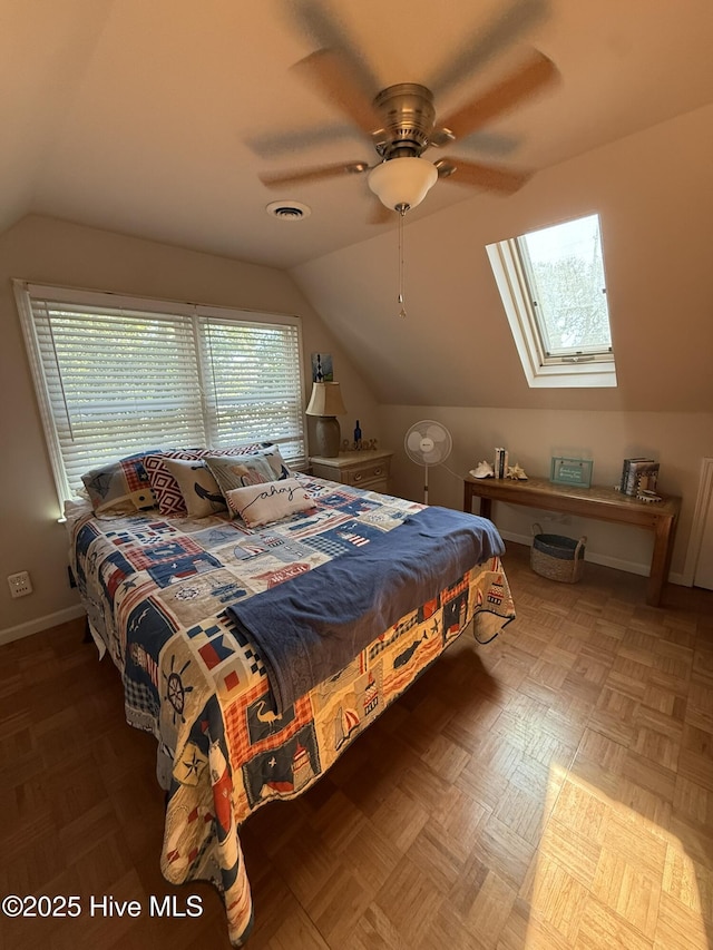 bedroom with baseboards, visible vents, vaulted ceiling, and a ceiling fan