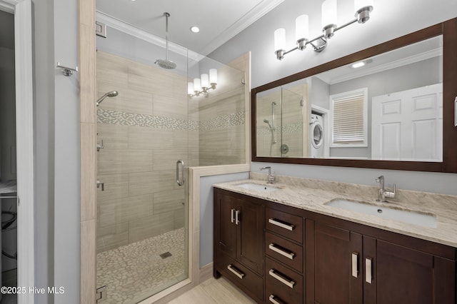 bathroom with ornamental molding, a sink, a shower stall, and double vanity