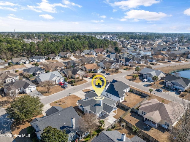 birds eye view of property with a residential view