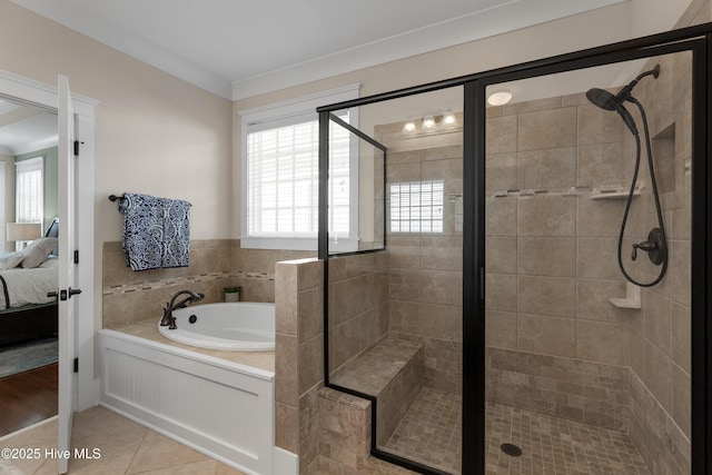 bathroom with tile patterned flooring, connected bathroom, a shower stall, and a bath