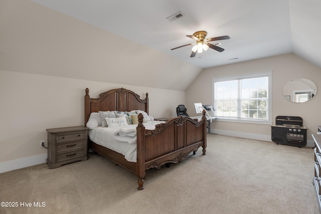 312 Moss Tree Dr, Wilmington, NC 28405 - bedroom with baseboards, light carpet, vaulted ceiling, and visible vents