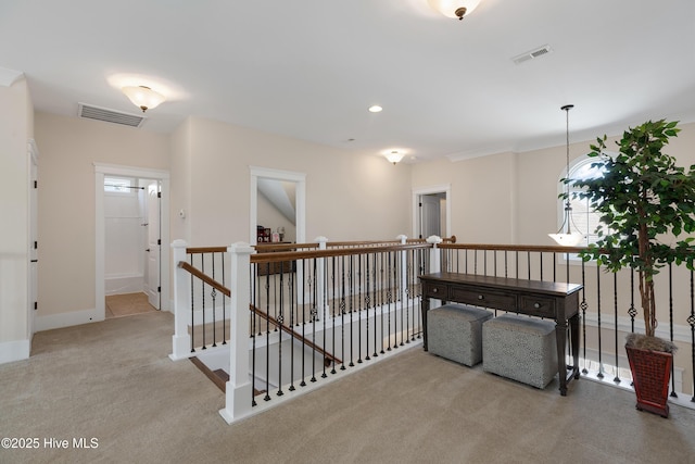 hall with visible vents, carpet flooring, an upstairs landing, and recessed lighting