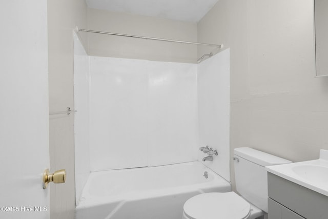 full bath featuring toilet,  shower combination, and vanity