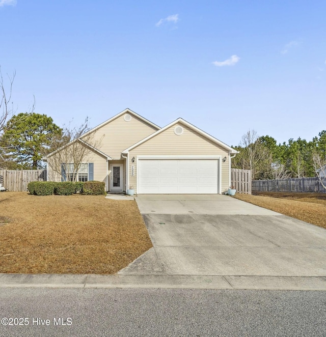 ranch-style house with concrete driveway, fence, and a garage