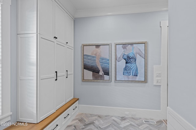 mudroom with crown molding