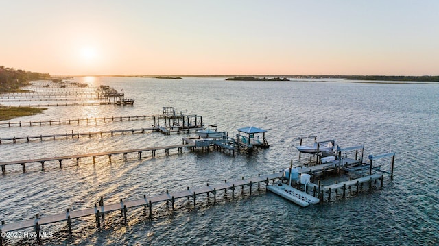 view of dock with a water view and boat lift