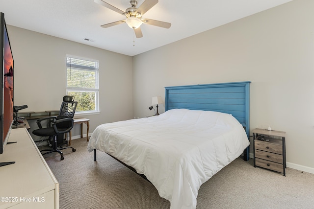 bedroom with baseboards, visible vents, ceiling fan, and light colored carpet