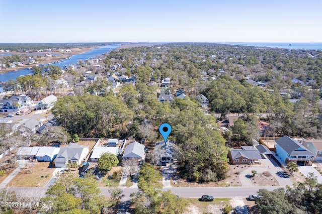 drone / aerial view featuring a water view and a residential view