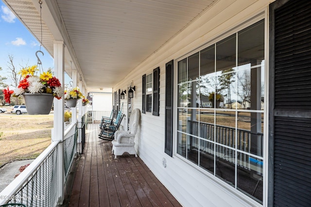 wooden deck featuring a porch