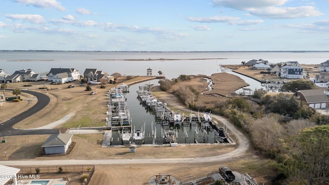 bird's eye view with a water view