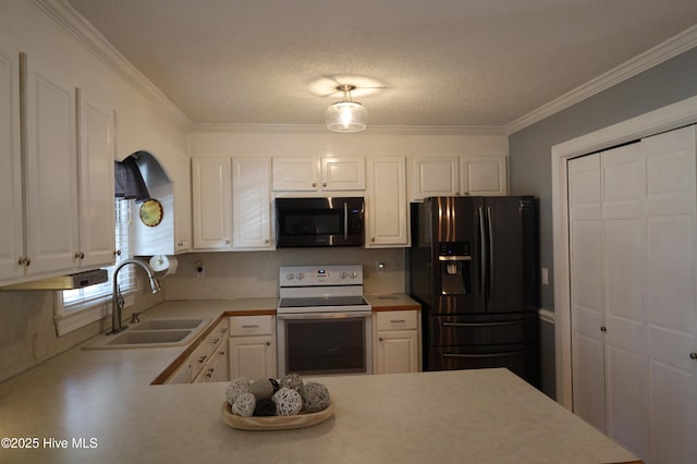 1426 Pocosin Rd, Winterville, NC 28590 - kitchen featuring stainless steel microwave, black fridge with ice dispenser, light countertops, a sink, and white electric range oven