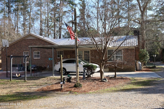 1426 Pocosin Rd, Winterville, NC 28590 - ranch-style house with an attached carport and brick siding