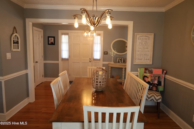 1426 Pocosin Rd, Winterville, NC 28590 - dining space featuring ornamental molding, wood finished floors, a chandelier, and baseboards