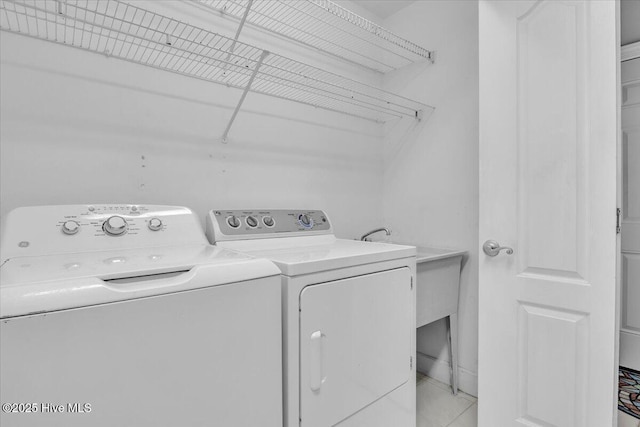 laundry room featuring laundry area and independent washer and dryer