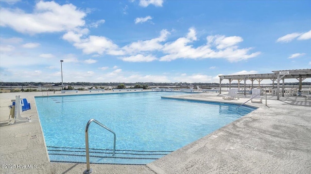 community pool featuring a patio area and a pergola