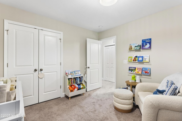 sitting room with light colored carpet