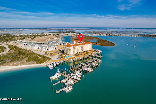 drone / aerial view with a water view