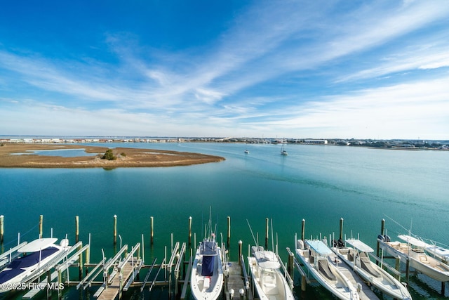 property view of water featuring a boat dock and boat lift