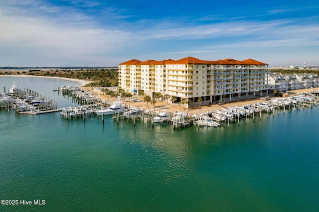 birds eye view of property featuring a water view