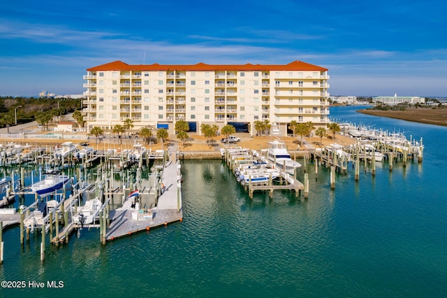 dock area featuring a water view and boat lift