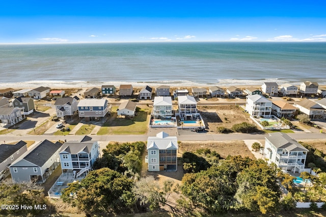 aerial view featuring a residential view and a water view