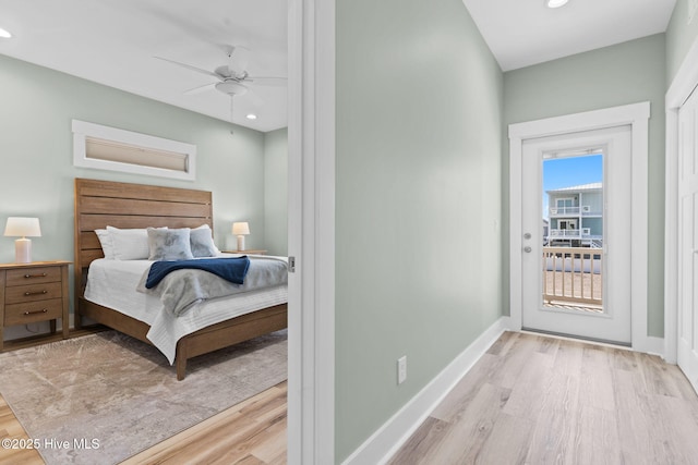 bedroom featuring wood finished floors, baseboards, recessed lighting, ceiling fan, and access to exterior