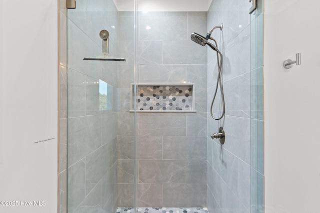 bathroom featuring a stall shower