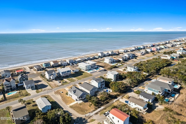 birds eye view of property featuring a residential view and a water view