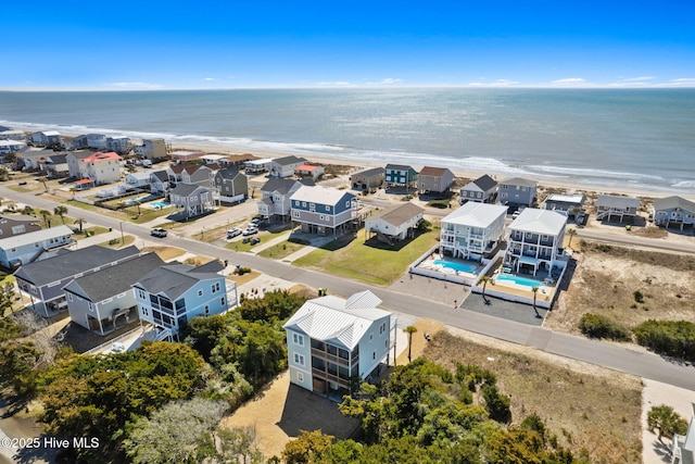 aerial view with a residential view and a water view