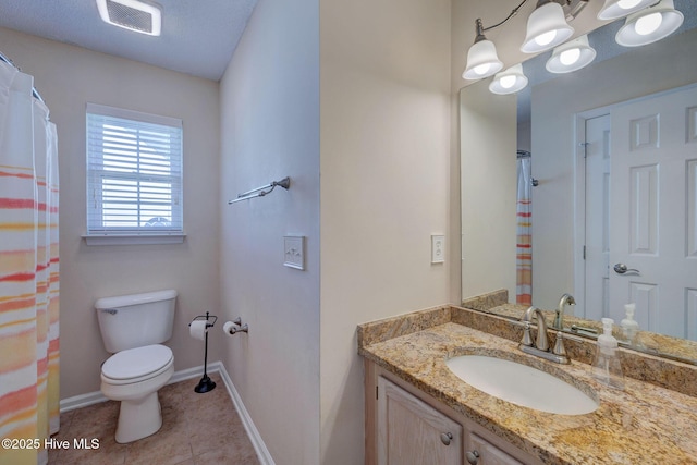 bathroom featuring visible vents, baseboards, toilet, tile patterned flooring, and vanity