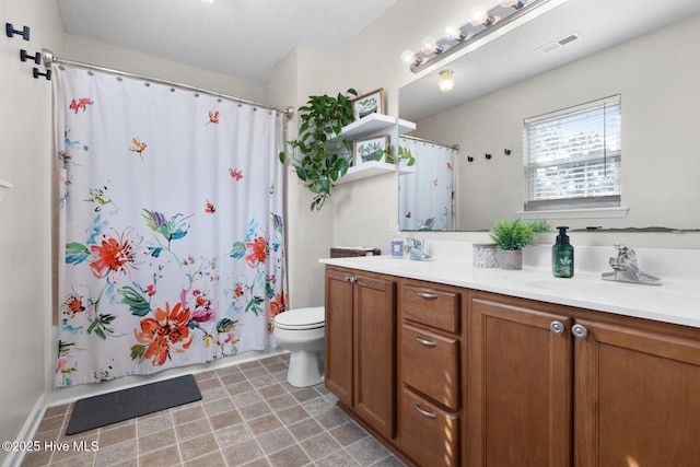 full bathroom with toilet, shower / tub combo, a sink, visible vents, and double vanity