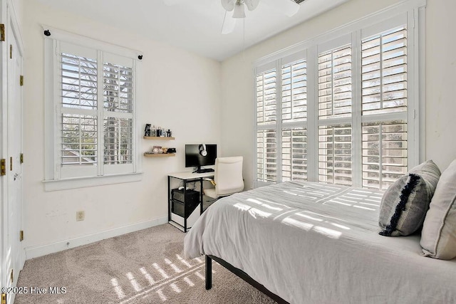 bedroom featuring carpet floors, ceiling fan, and baseboards