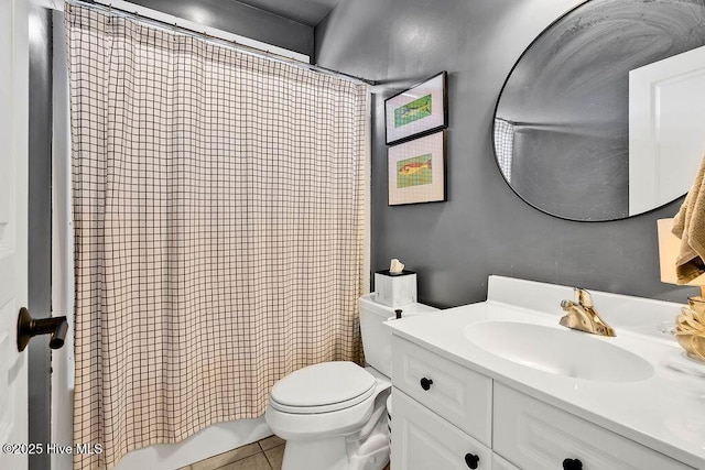 bathroom with shower / tub combo, tile patterned flooring, vanity, and toilet