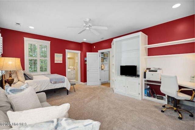 carpeted bedroom with recessed lighting, visible vents, ceiling fan, and ensuite bath